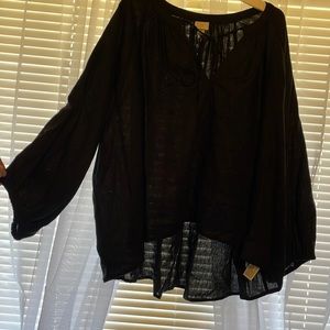 A new day long sleeve top. Size extra large.